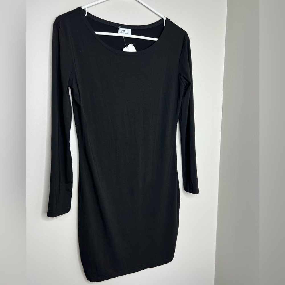 NWT - PIKO (small) black long sleeve dress, knee length. Purchased from GLIK’S.